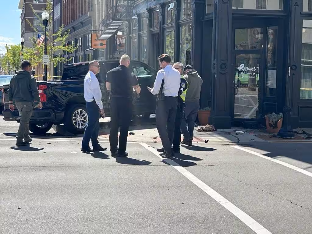 Crash in Covington sends 2 to hospital, leaves butcher shop damaged